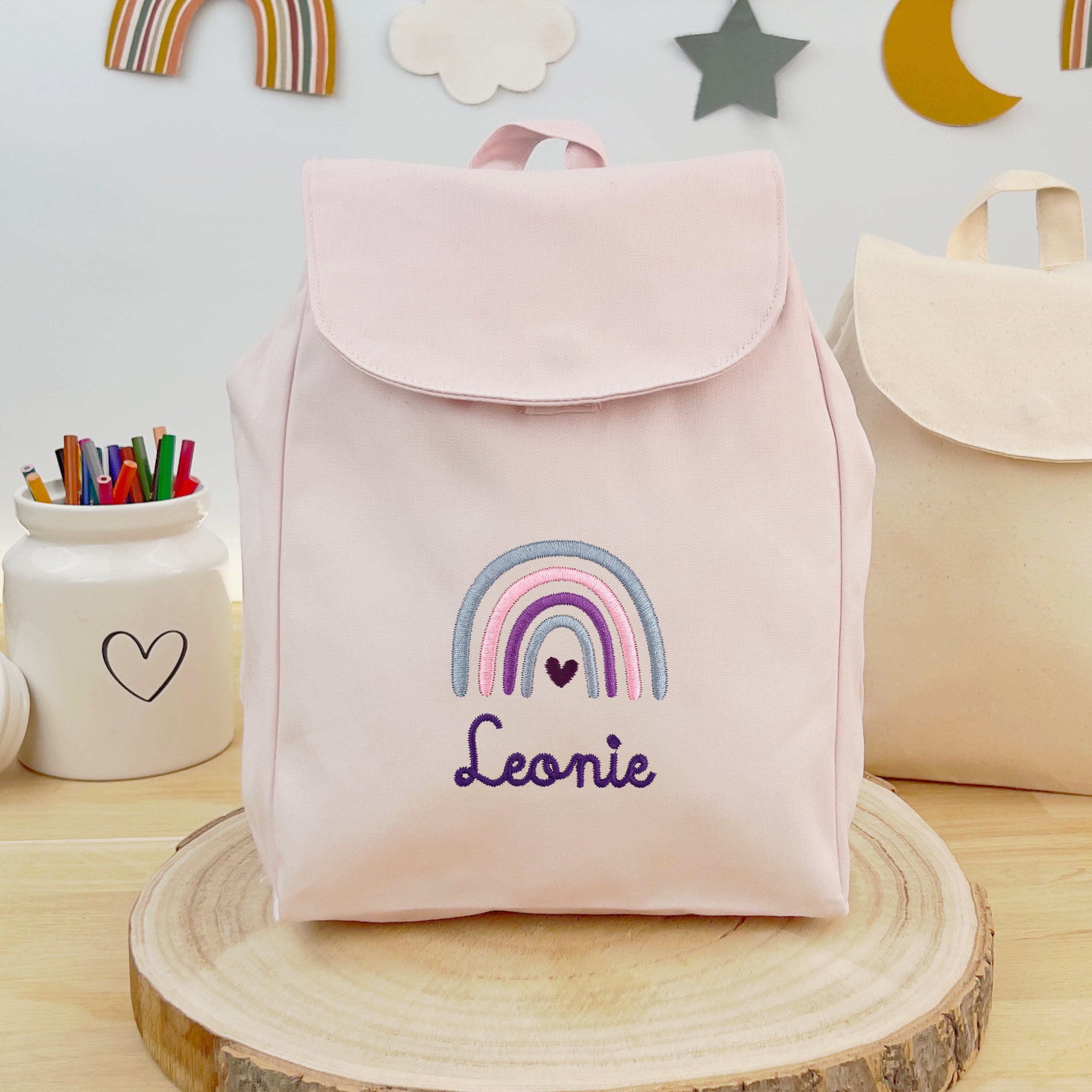 Bio Kinderrucksack mit Namen und Regenbogen - Rosa/Lila
