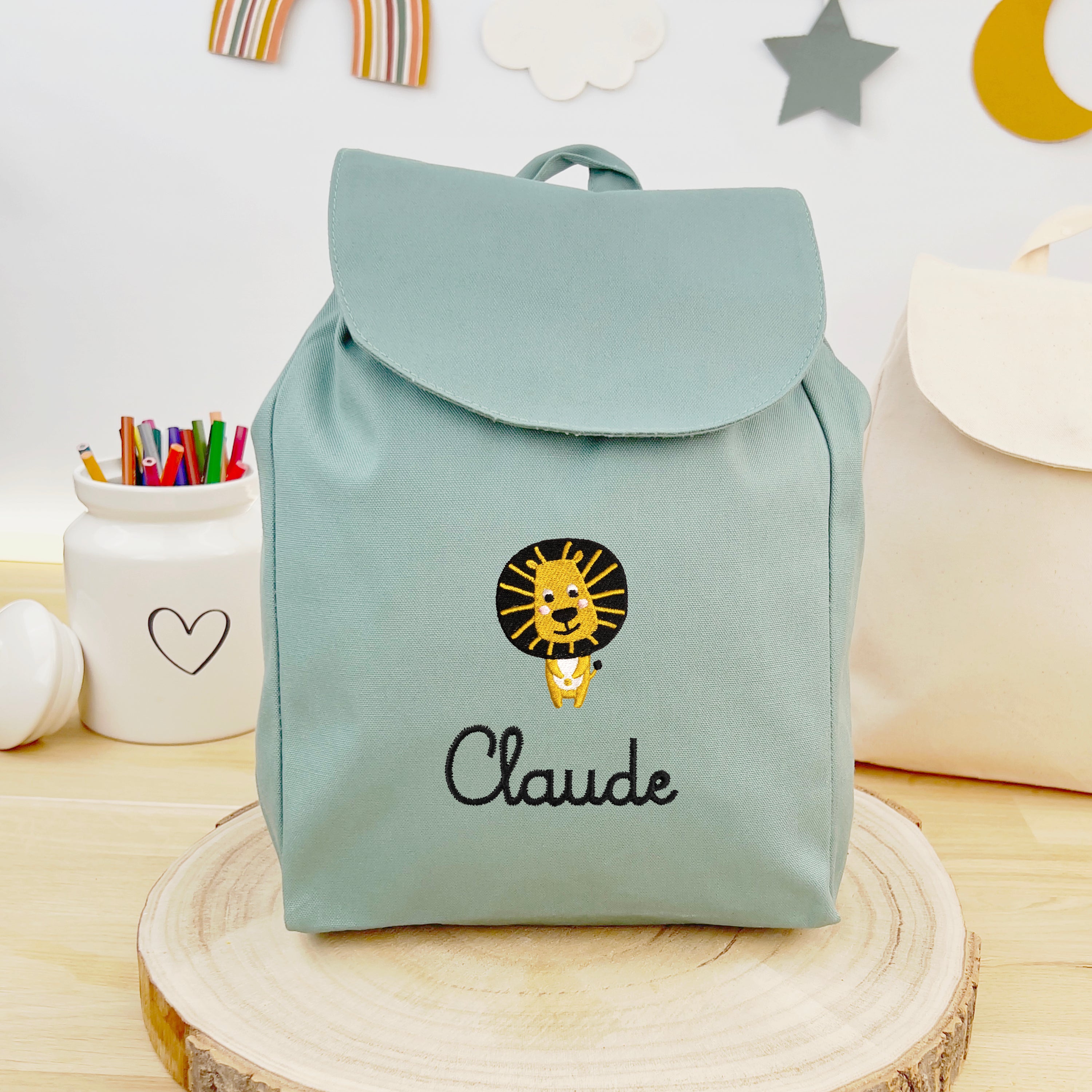 Bio Kinderrucksack mit Namen und Regenbogen - Mint/Schwarz