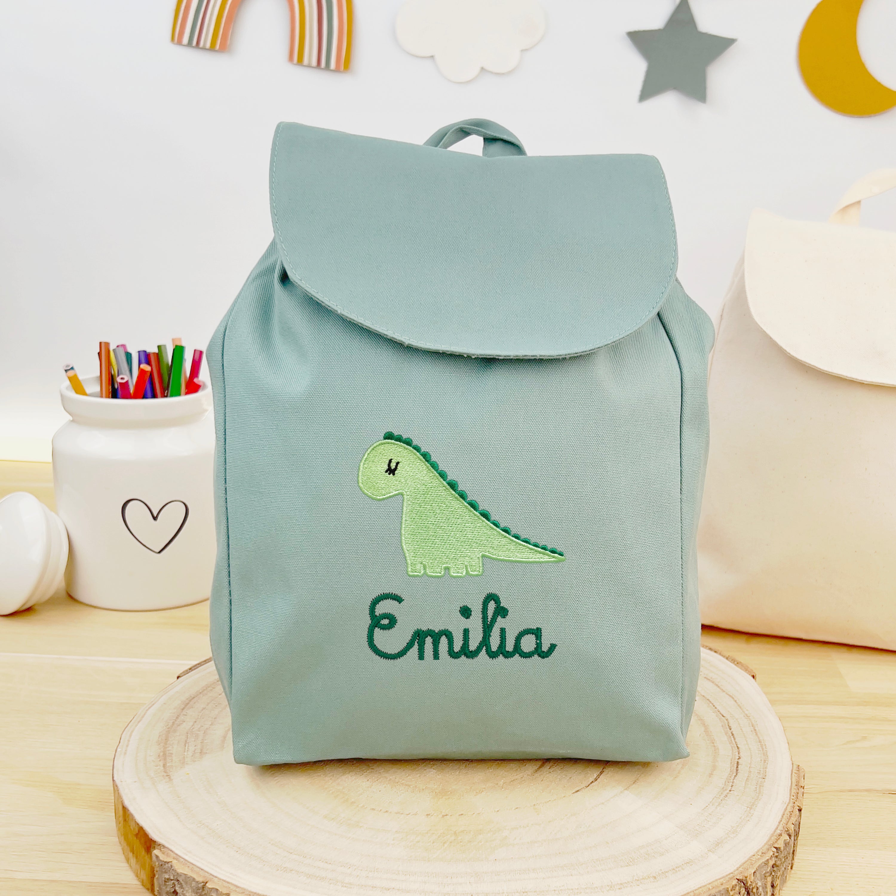 Bio Kinderrucksack mit Namen und Dino - Mint/Grün
