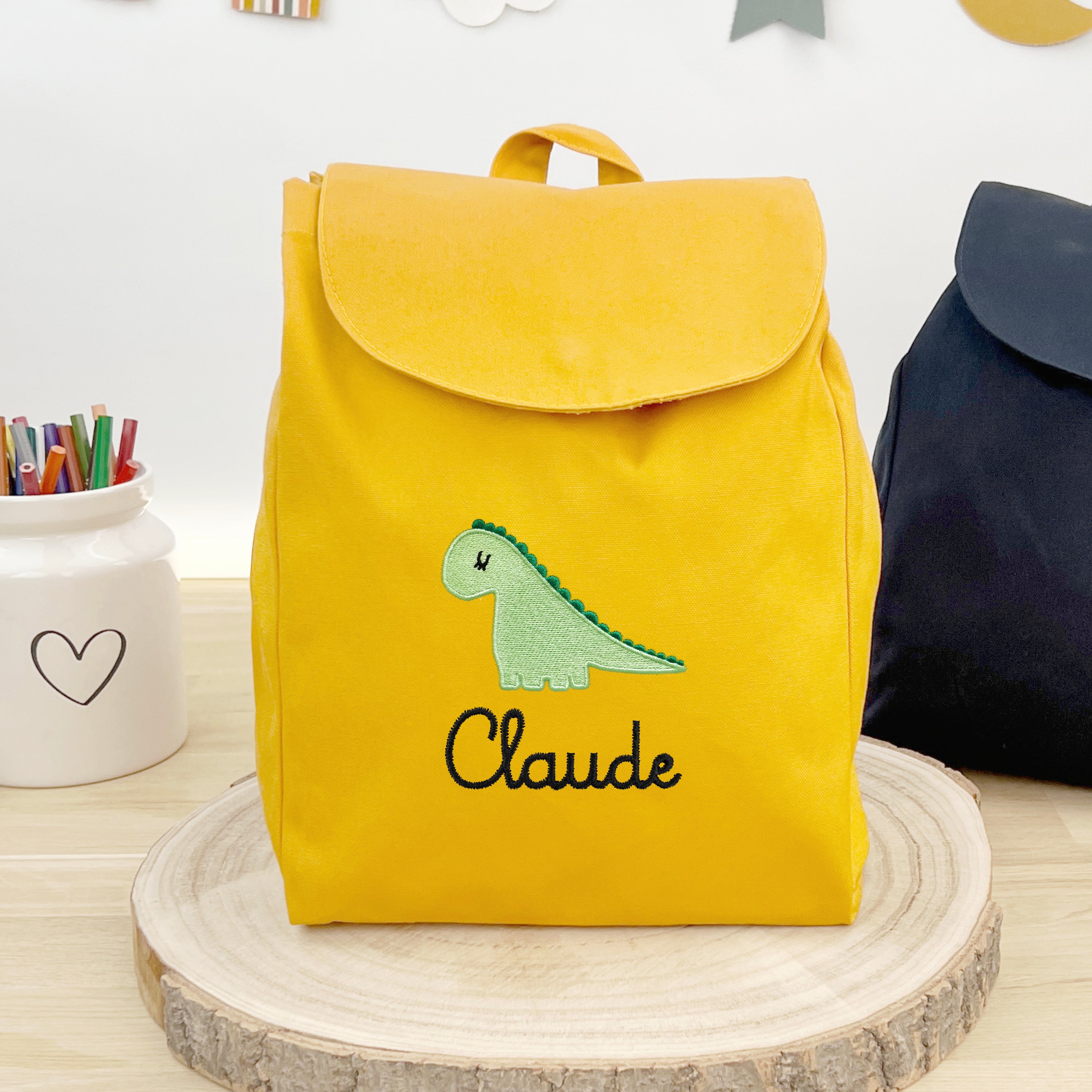 Bio Kinderrucksack mit Namen und Dino - Senf/Schwarz